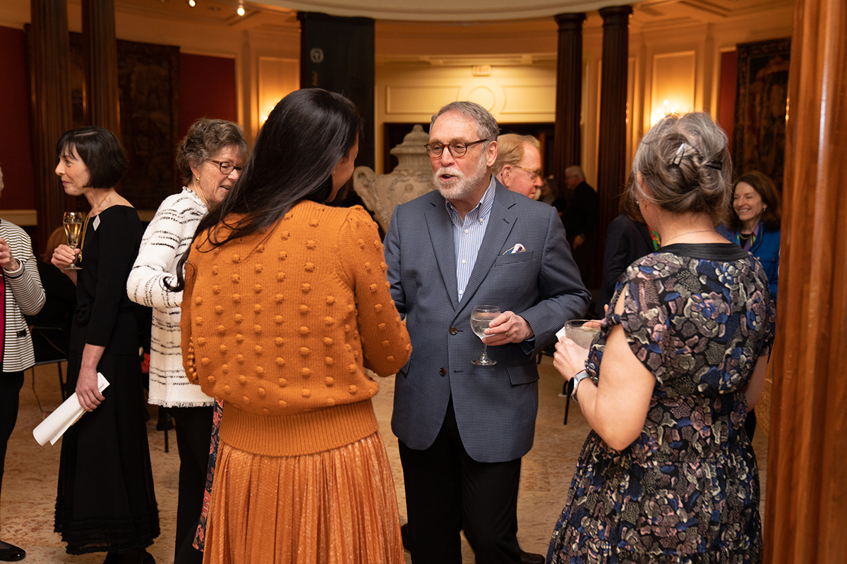 Steve Pavsner, member of The Frick Pittsburgh Board of Trustees, converses with guests.