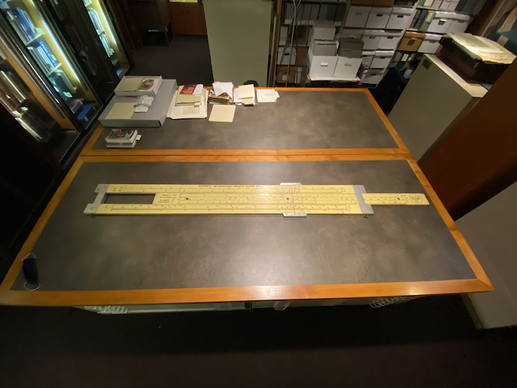 image of slide rule on table