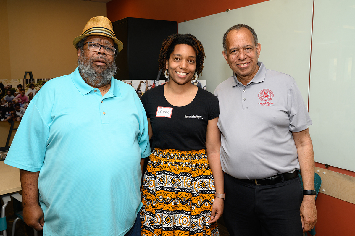 NSBE (National Society of Black Engineers) founders Aaron Johnson (ENG 1981) and Eric Cheek (ENG 1981) with Destenie Nock, assistant professor of Engineering & Public Policy and Civil & Environmental Engineering