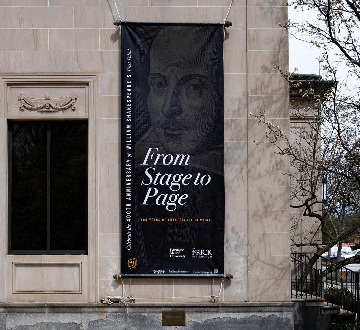 Detail of an external banner on the façade of the Frick Art Museum.