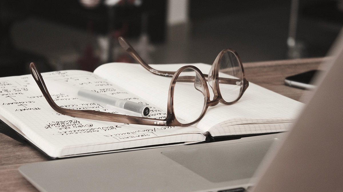 Glasses on paperwork