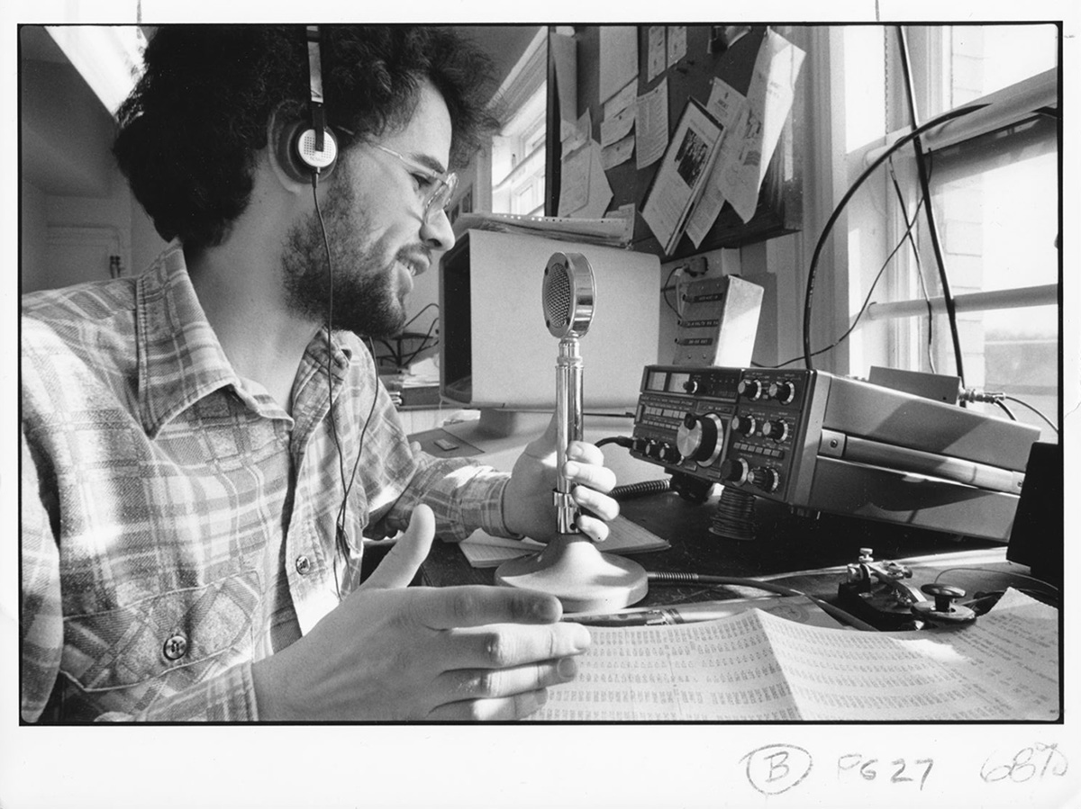 A college student deejays from Carnegie-Mellon University's WRCT radio station. (c.1975)