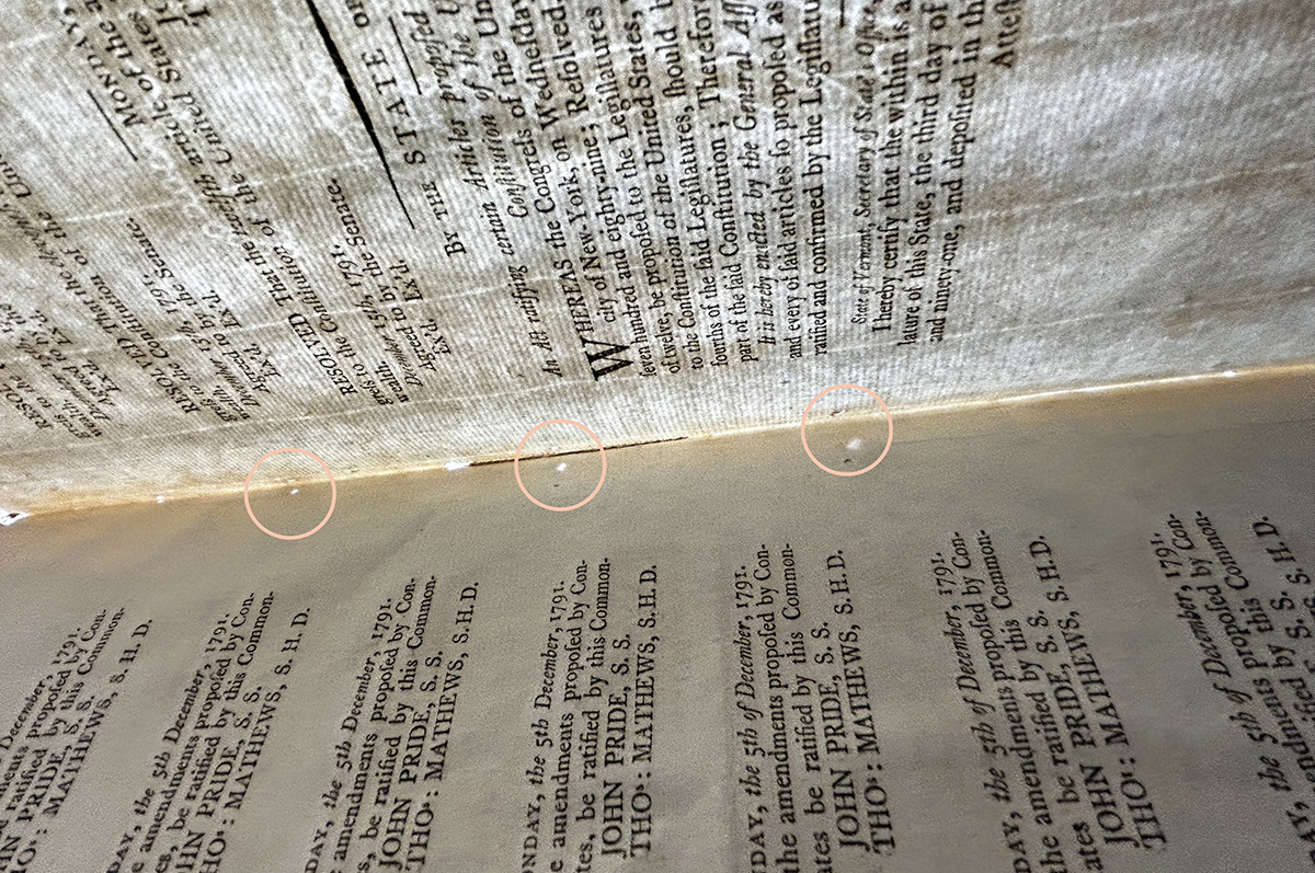 Evidence of stab-stitching in the Posner copy, CMU Special Collections.