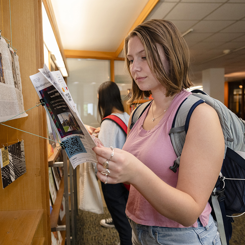 Students flip through publications