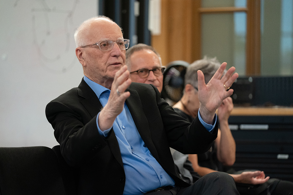 Don Carter, retired senior research fellow at the Remaking Cities Institute and CMU professor, asks Torello a question during the Q&A.
