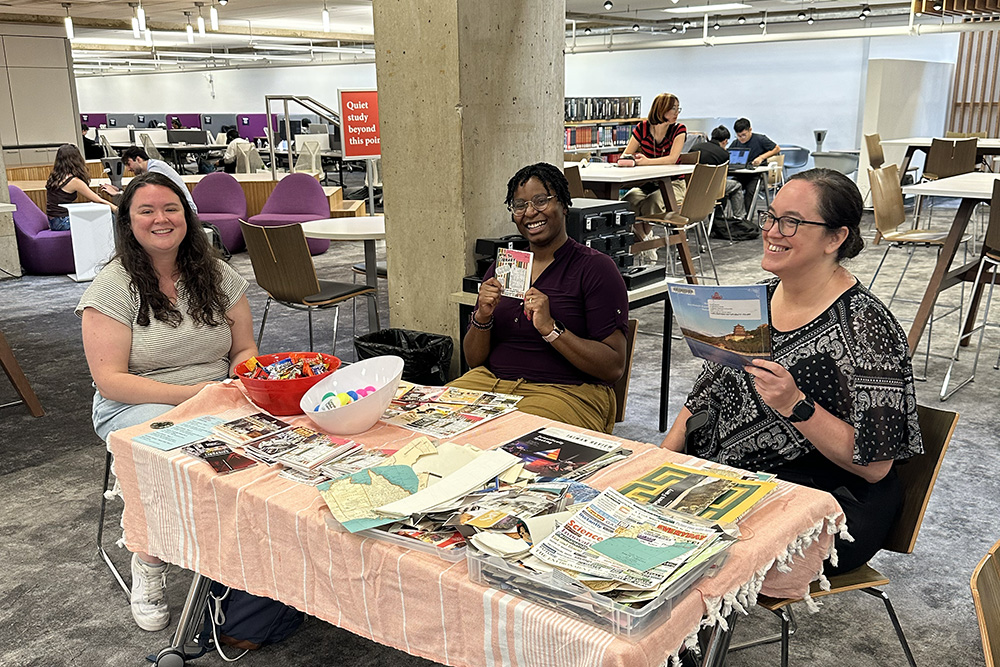 In Sorrells Library, Computational Research Librarian Erin Higgins, Open Science Postdoctoral Research Associate Chisom Obasih, and STEM Librarian Kristen Scotti shared information about the Libraries and helped visitors make buttons.