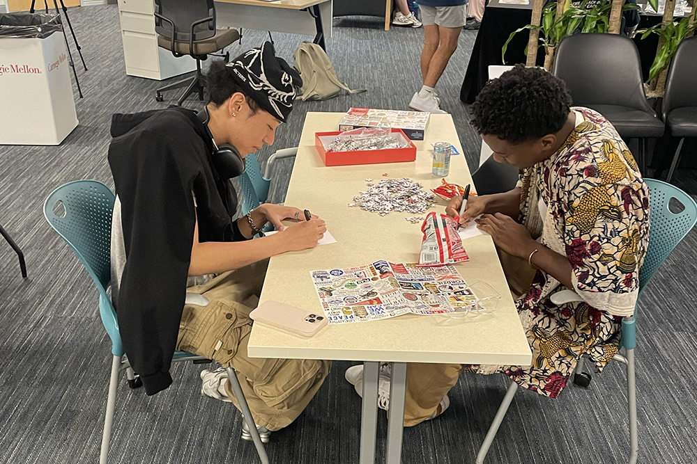 Different students dropped in throughout the event to design postcards and contribute to the community puzzle.