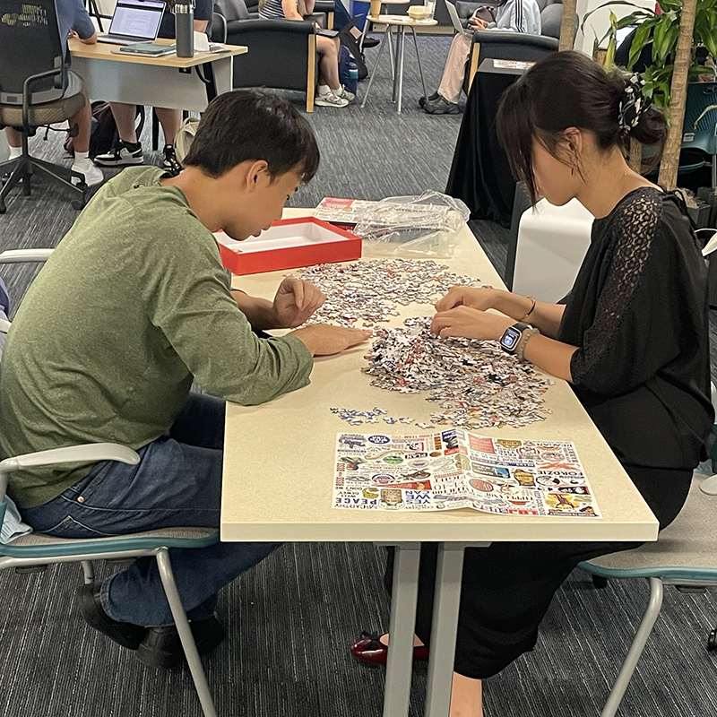 Community members worked on a civic-engagement themed puzzle.