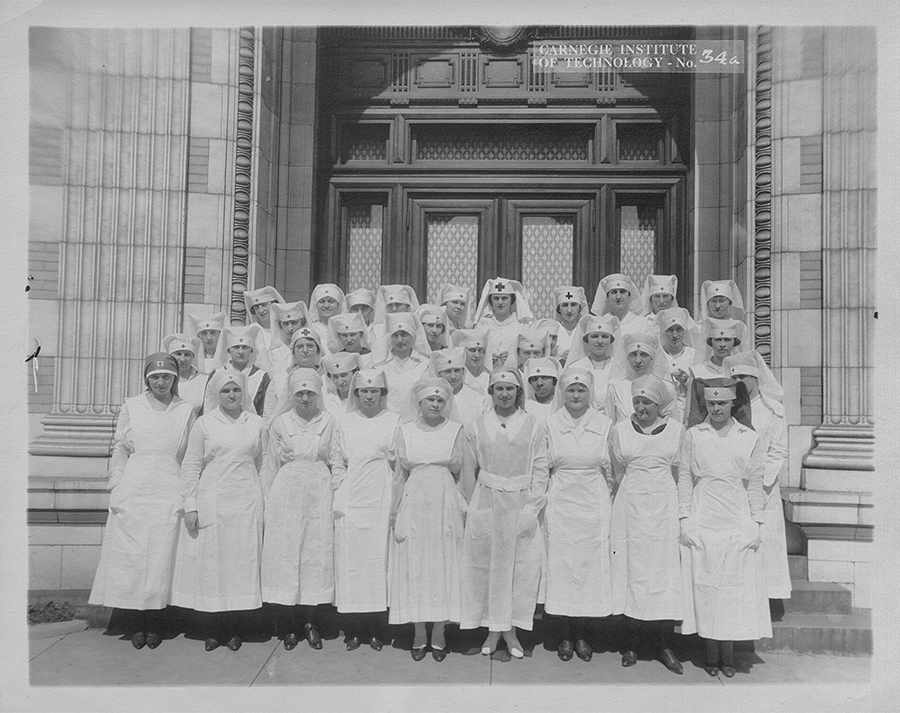 Red Cross Nurses, 1918. Nurses assigned to care for the soldiers on campus pose in front of Margaret Morrison Carnegie College―Carnegie Tech’s women’s college. World War I Records Carnegie Mellon University Archives.
