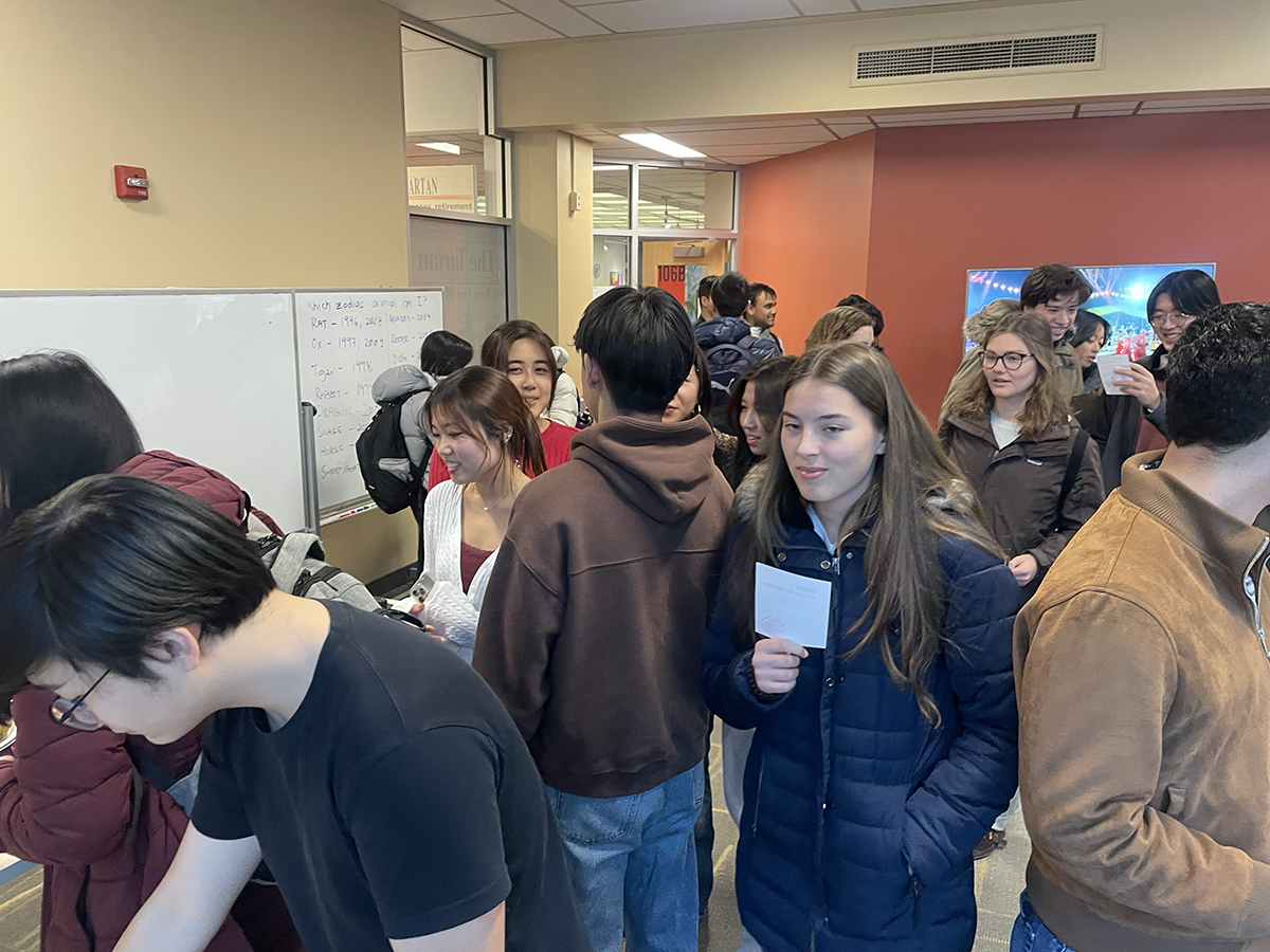 Attendees gather in Studio A to take part in Lunar New Year festivities.