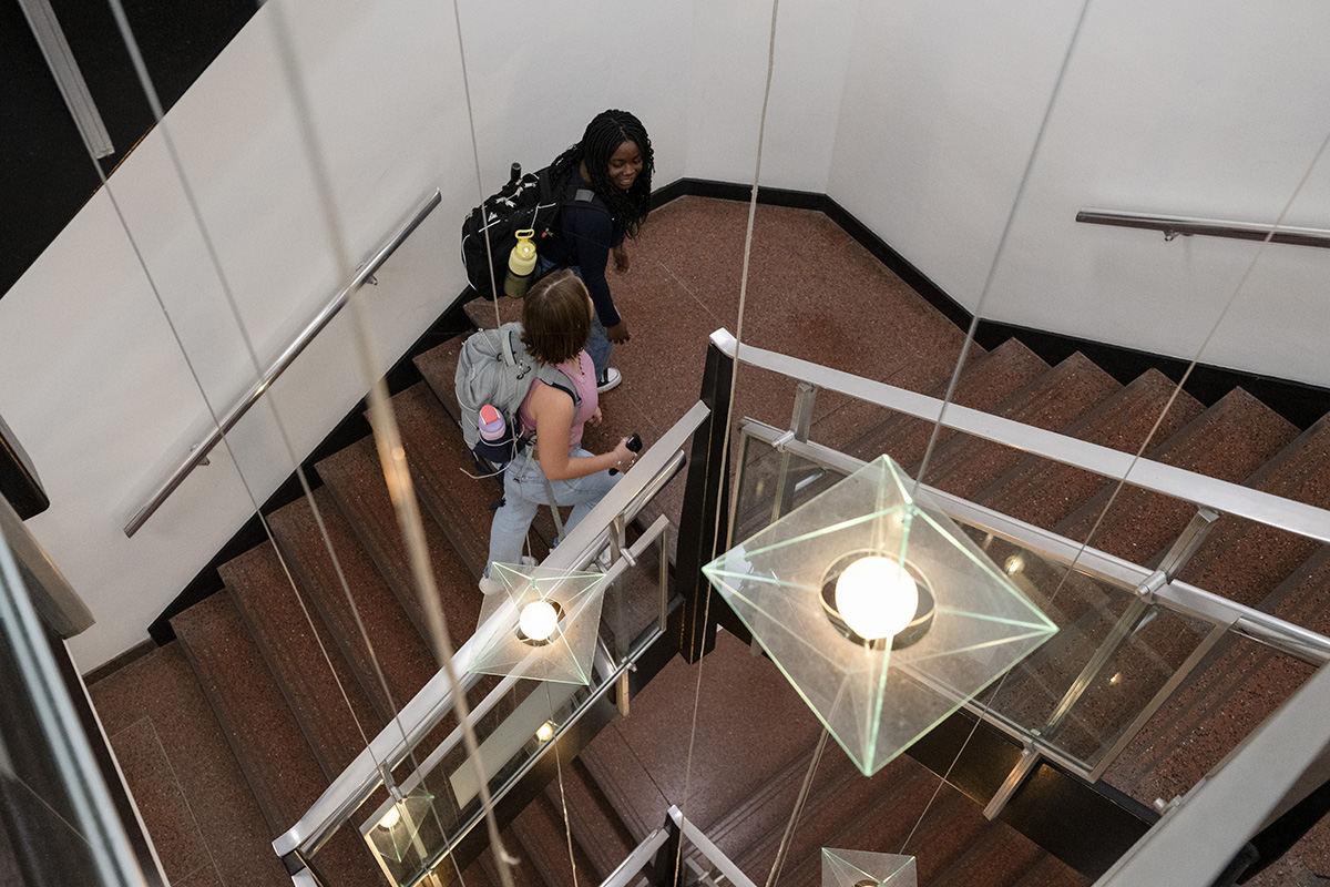 Students going up the stairs at Hunt Library. Photo by Rebecca Devereaux.