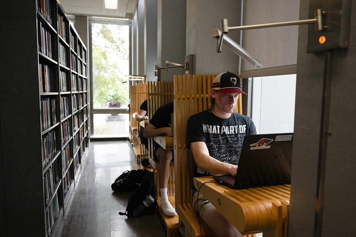 Student at laptop in Hunt Library. Photo by Rebecca Devereaux.