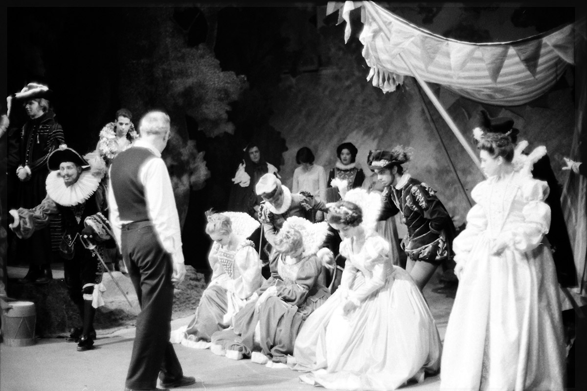 School of Drama Department Head, Professor Henry F. Boettcher, talks to a group of student actors on stage during a rehearsal of the School of Drama's production of William Shakespeare's "Love Labour's Lost."