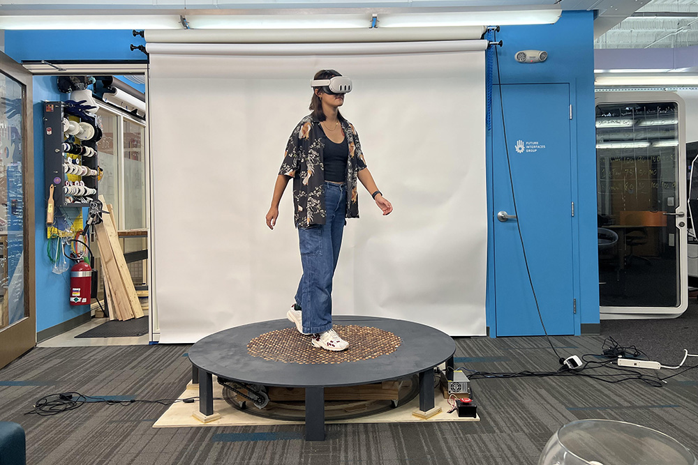 Vivian Shen tests a prototype in her Future Interfaces Group lab
