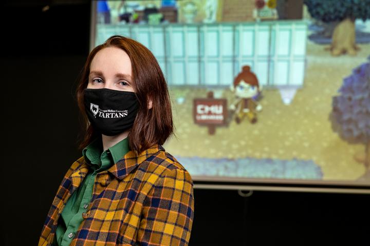 Hannah Gunderman on the front page wearing a mask