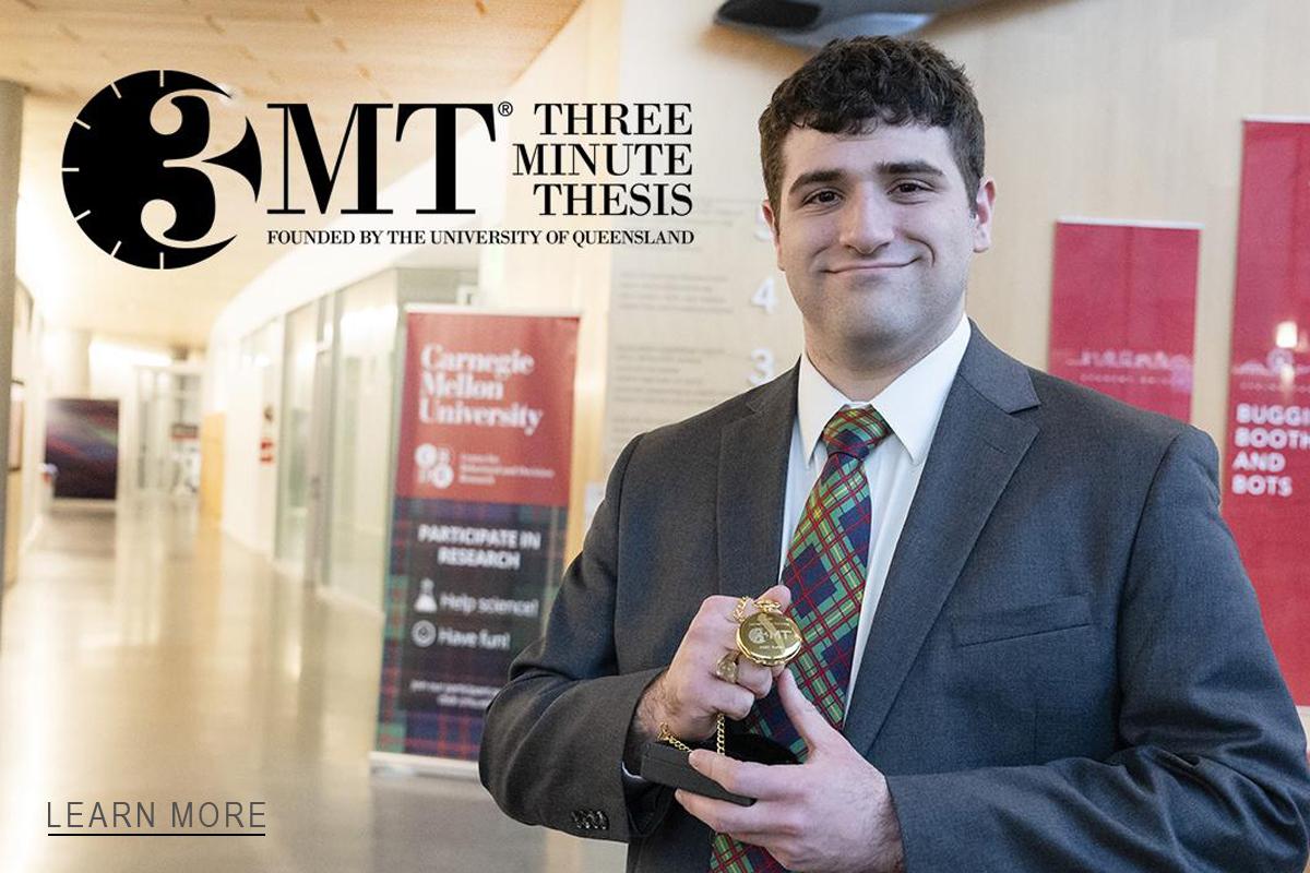 3MT - Student holding first place award