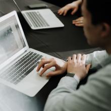 man on computer